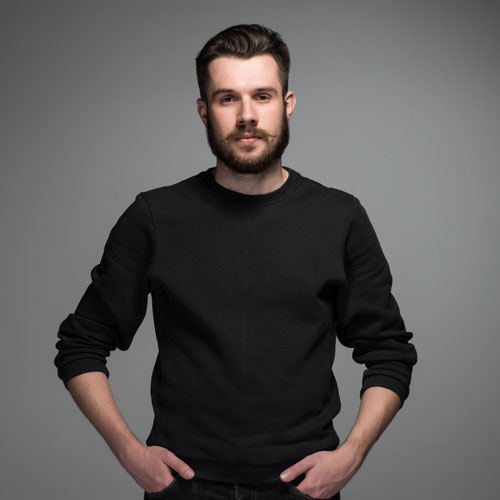 fashion portrait of young man in black PRRGJWK