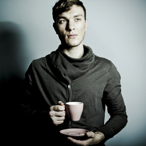 young man having a cup of coffee P3FRH28
